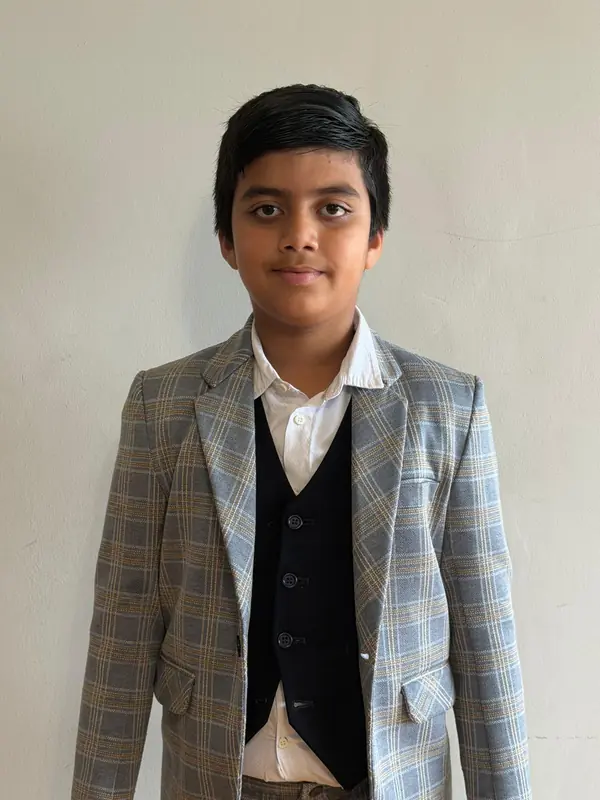 Boy's custom three-piece suit tailored by Raymik Custom Tailor